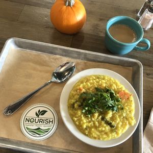 Kitchari with cilantro, and house made oat chai. at Nourish Wellness Cafe in Costa Mesa