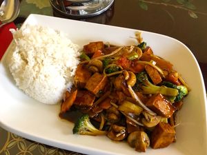 This is called: "Dishes of the Buddhists".
Tofu and mixes veggies in soy sauce - served with rice.
 at Pacific House in Hannover