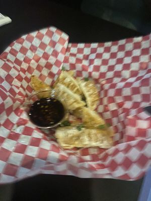 Sorry for the terrible picture- but kimchi potstickers  at Osoyami Bar and Grill in Honolulu