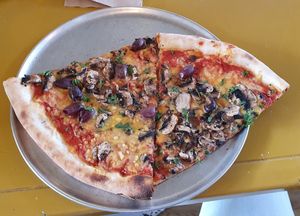 BIG $5 vegan slices....really enjoyable! at Vinci's Pizza in Napier