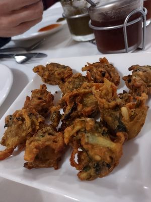 Vegetable Pakora fried in fresh sunflower oil in cast iron at Jewel Of India in San Luis Obispo