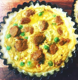 Curry CHKN and garden pease Quiche at Dauns in East London