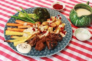 Scandi inspired Sunday Roast with BBQ Seitan, Roast potatoes, trimmings, Creamed gravy, Lingonberries and Horseradish Mayo at Dauns in East London