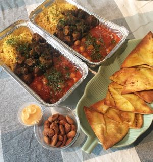 Moroccan Chickpea & Spinach Stew with Couscous, CHKN Soya Bites, Smoked Almonds, Saffron Aioli and Baked Flat Bread at Dauns in East London