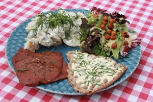 Swedish Creamy potato salad, Seitan Roast slices, salad with Dijon Vinaigrette and toasted Chickpeas, Swedish Crisp bread with Chive butter at Dauns in East London