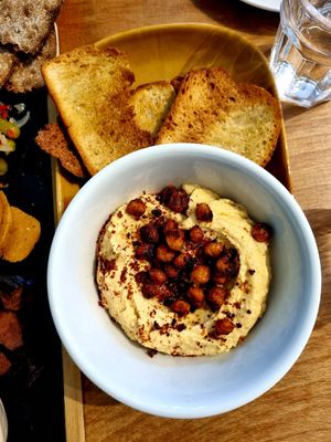 Houmous with crispy chilli chickpeas and olive oil baked sourdough. at Dauns in East London