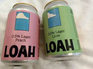 Two cans of 0.5% lager (peach and lime flavours) at Dauns in East London