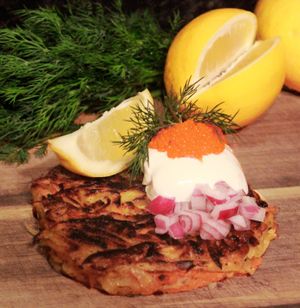 Swedish Rösti or Råraka with Oatly Creme Fraiche, Seaweed Caviar, Dill, Red Onion and Lemon. Served room temperature at markets or supper clubs. at Dauns in East London