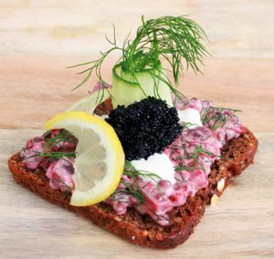 Beetroot salad with homemade Mayo on Danish Rye bread with Seaweed Caviar, Cucumber, Dill and Lemon. Served room temperate on markets and events. at Dauns in East London