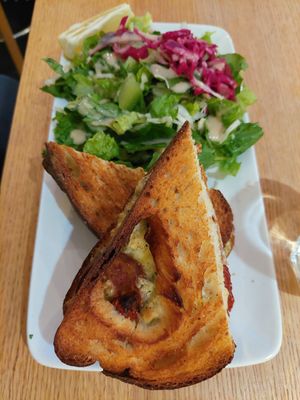 Grilled sandwich with chorizo, sundried tomatoes, cheese, pesto. at Delivore in Stockholm