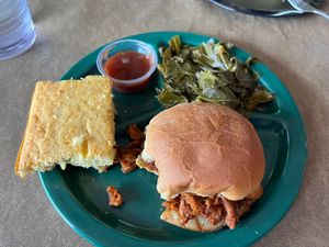 BBQ soy curls sandwich with collard greens and cornbread.  at Black Bear BBQ in Asheville