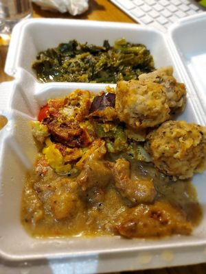 The best vegan steak and gravy I ever had with fried mushrooms, eggplant parmesan, and greens 😋 at Daisy's Cafe II in Hazel Crest