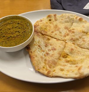 Masala kulcha with sag paneer   at Raja in Naha