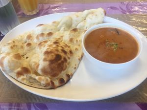 Mixed vegetable curry with naan  at Raja in Naha