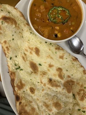 Garlic naan and mixed vegetable curry at Raja in Naha