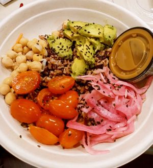 purple rice blend, chickpeas, grape tomatoes, pickled red onion, avocado, black sesame seeds, balsamic dressing at CoreLife Eatery in Springfield