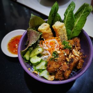 Bún “Non-Thịt” Nướng
Our Meatless Take on the Staple of Vietnamese Cuisine: Rice Noodles, Grilled Homemade Seitan, Vegan Spring Roll , Pickles, Non-Fish Sauce, Fresh Herb at Bun Bar in Ho Chi Minh City