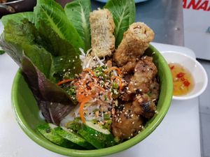 Bún “Non-Thịt” Nướng
Our Meatless Take on the Staple of Vietnamese Cuisine - Rice Noodles, Grilled Homemade Seitan,
Vegan Spring Roll , Pickles, Non-Fish Sauce, Fresh Her at Bun Bar in Ho Chi Minh City
