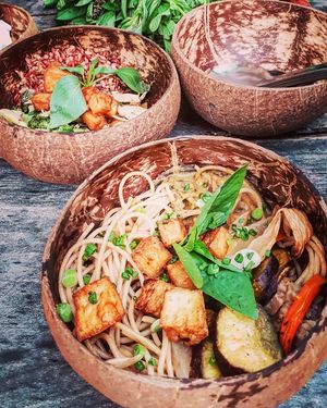 Eco-friendly outdoor market paired with vegan dishes  at Bun Bar in Ho Chi Minh City