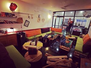 Colorful and comfy living room space to enjoy your dinner  at Bun Bar in Ho Chi Minh City