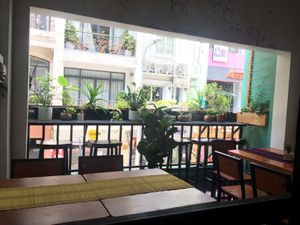 Balcony outdoors seating  at Bun Bar in Ho Chi Minh City
