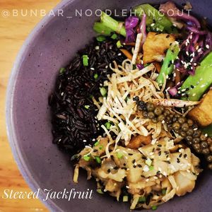 Black rice with jackfruit stew and sautéed veggies and tofu  at Bun Bar in Ho Chi Minh City