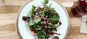 s toast with salad and dried tomatoes (toast of the day) at L'Alchimiste in Brussels