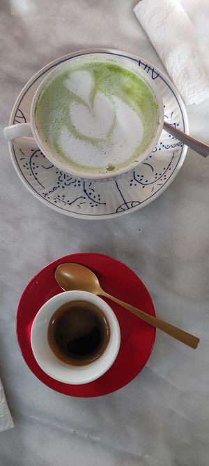 Matcha latte and coffee at L'Alchimiste in Brussels