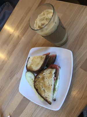 Tofu lettuce and tomato and an iced chai  at The Hostel Cafe in Portland