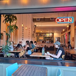 Atmosphere, good vibes + great 🎶 playing in the background at The Hostel Cafe in Portland