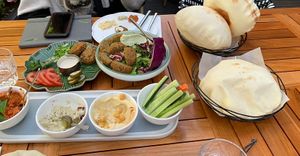 Halfway through the meal - we were hungry 😅  at Eli Falafel - Jiujiang Rd in Shanghai