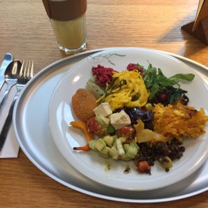 delicious vegetarian food with hot lemon and ginger tea at Tibits in London