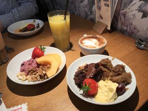 Desserts, juice and coffee at Tibits in London