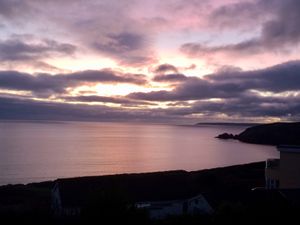 A true Cornish sunset from your patio at Greystones in Praa Sands