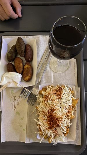 Croquetas, papas locas y vino    at Mel Vegan Fast Food in Tenerife