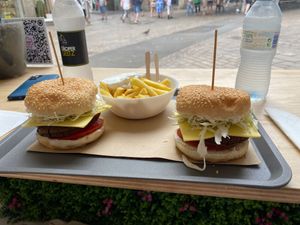 Legumes burgers with tomato, cabbage, and vegan cheese + fried potatoes and an amazing mayo at Mel Vegan Fast Food in Tenerife
