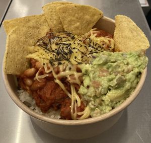 Homemade 3 bean chilli on rice with homemade guacamole (real avocados!) and corn chips. 🥰🌱  at The Blue Bell in Conwy