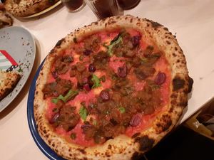 Vegan pizza without vegan parmesan (wasnt available) at The Dainty in Chamonix-mont-blanc