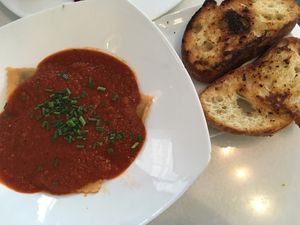 Spinach artichoke ravioli with garlic bread at Ananda Fuara in San Francisco