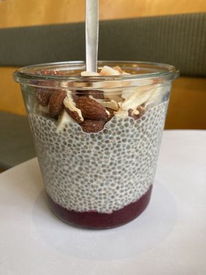 Seasonal „red berry“ chia pudding (peanut butter hidden inside 😍)  at GRØD in Aarhus