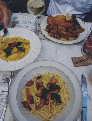 Main course: Carbonara, Gnocchi with saffron, and the Milanese cotoletta.  at Spritz in Antwerpen