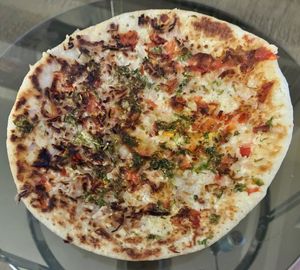 Tomato and onion uttapam  at Rangoli in Dubai