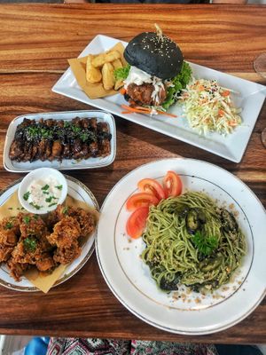 Black magic burger, basil pesto spaghetti, popcorn mushrooms & panggang tempeh 🙌🏼 at Blue in Penang