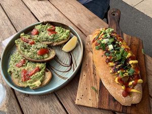 Hot dog. Smashed avo (without cashew feta ) at Love Madre in Cheltenham