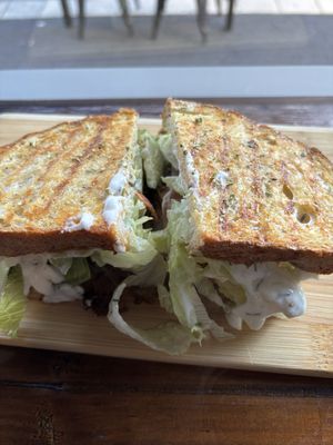 Souvlaki toastie   at Love Madre in Cheltenham