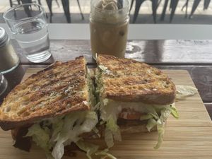 Souvlaki toastie and iced coffee with ice cream   at Love Madre in Cheltenham