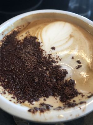 Love coffee when they use chocolate flakes! at Love Madre in Cheltenham