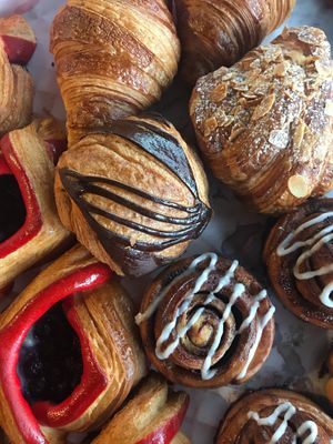 Pastries!!!! Your choice of plain, almond or chocolate croissant, as well as a blueberry danish and cinnamon scroll...x at Love Madre in Cheltenham