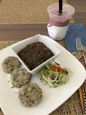 black bean stew, dumplings and berry seamoss smoothie  at Living Food and Juices in Kingston