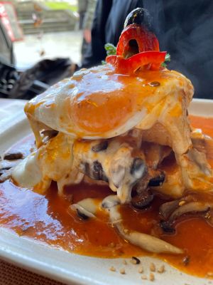 Mushroom francesinha with egg and sauce (Vegetarian) at Tudo aos Molhos in Sao Joao Da Madeira